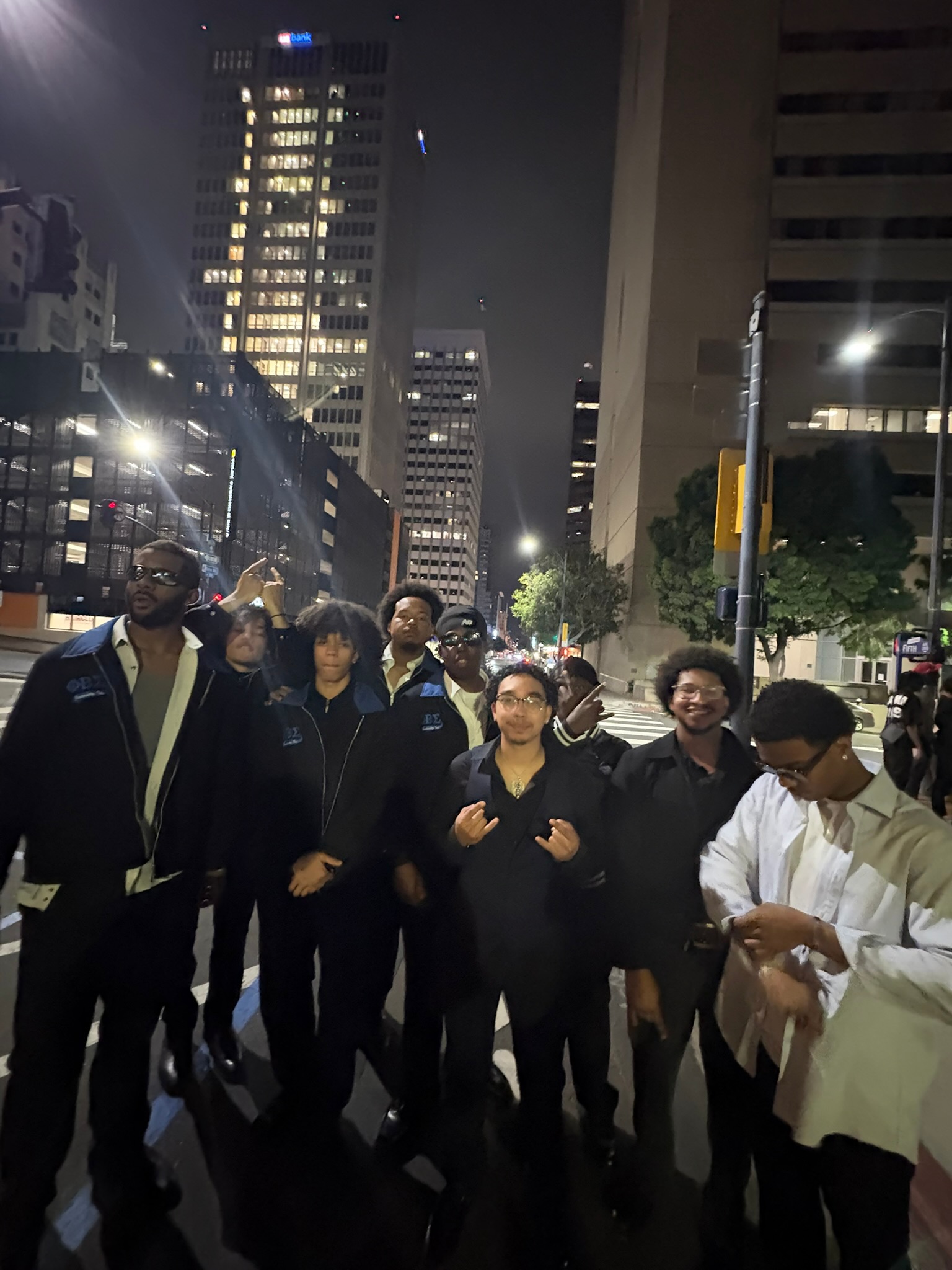 Brotherhood gathering downtown at night